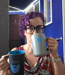 Arielle DeLisle, a voice actor in her 40's with short curly purple hair, alternates 2 mugs with eyes wide, staring into the camera.